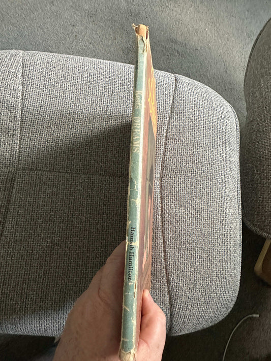 Side view of Dreams Ezra Jack Keats first edition book showing vintage design and spine details