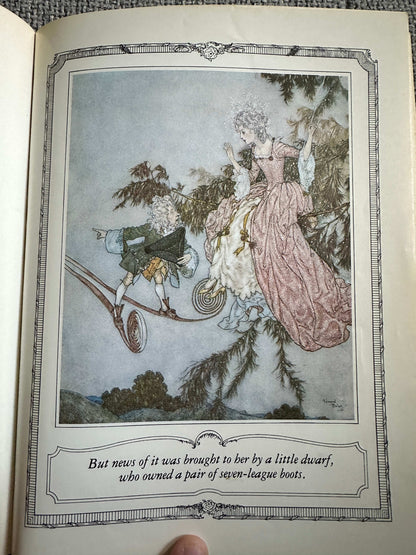 Edmund Dulac illustrated fairytales page showing a dwarf and a lady in a whimsical landscape
