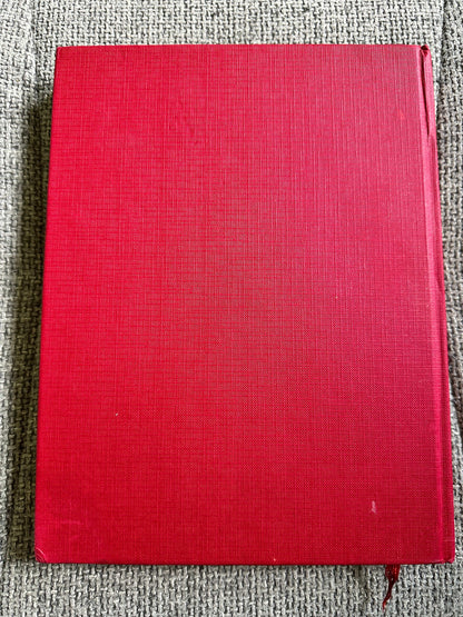 Red hardcover of Edmund Dulac illustrated fairytales book, featuring a textured surface