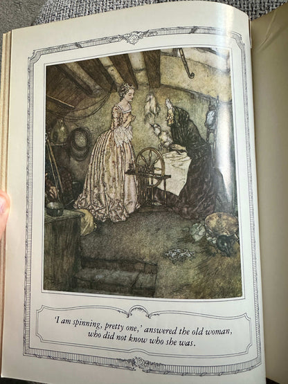 Edmund Dulac illustrated fairytales featuring a young woman and an old woman in a cozy cottage scene