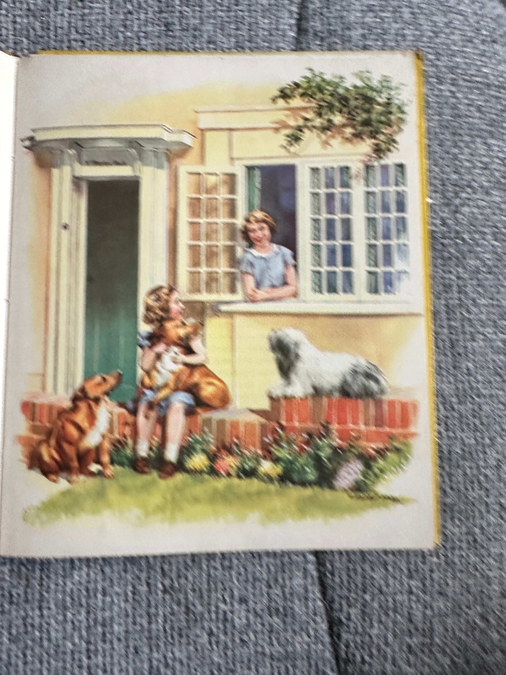 Illustration from Enid Blyton The Story Of Our Queen first edition featuring children and dogs by a house