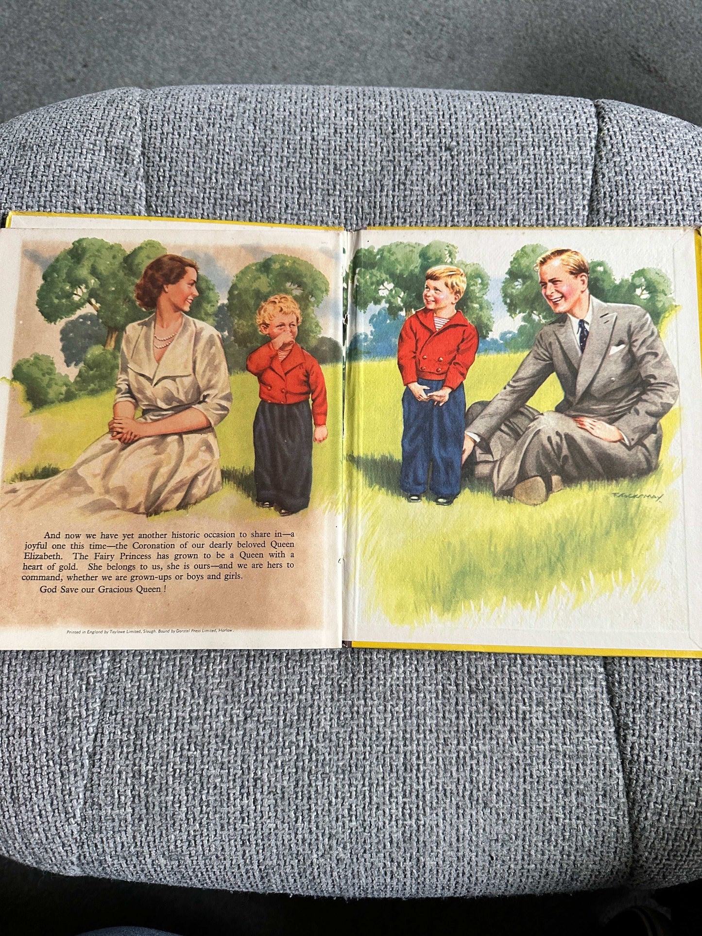 Enid Blyton The Story Of Our Queen first edition open book with colorful illustrations of children and a royal figure