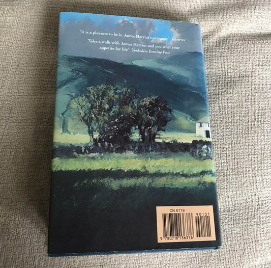 First edition James Herriot Every Living Thing book cover featuring a serene landscape painting