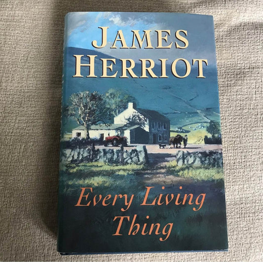 First edition James Herriot Every Living Thing book cover featuring scenic countryside illustration