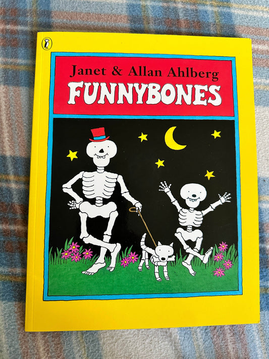Funnybones Janet and Allan Ahlberg book featuring playful skeletons and a cat in a nighttime scene