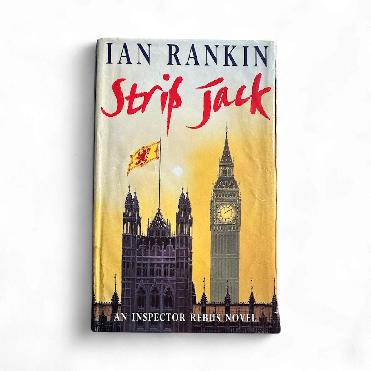 Rare Ian Rankin novels for collectors featuring the book Strip Jack with Westminster backdrop