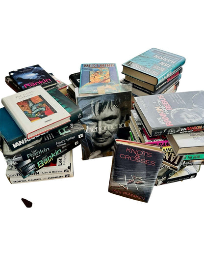 Collection of rare Ian Rankin novels for collectors displayed in a stacked arrangement.