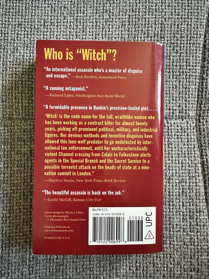Back cover of signed first edition Witch Hunt Ian Rankin with book description and reviews