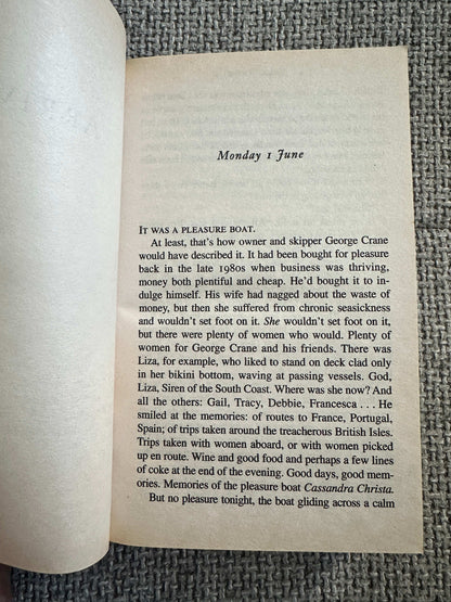 Signed first edition Witch Hunt Ian Rankin in a vintage book format with a worn page showing the opening text
