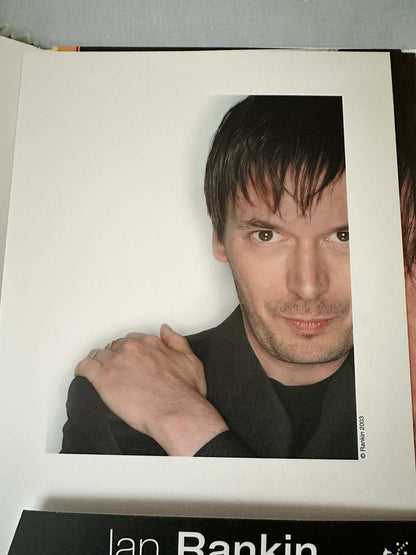 Ian Rankin signed press pack featuring an image of the author with a casual pose