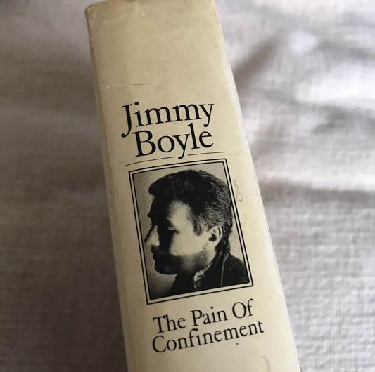 Jimmy Boyle The Pain Of Confinement first edition book spine featuring a profile image of the author