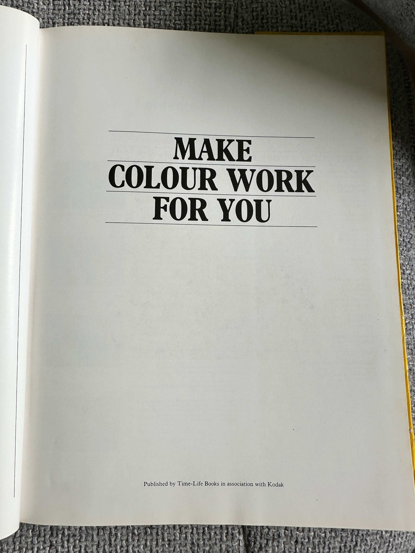 Open page of Kodak creative photography book with the title Make Colour Work For You displayed prominently