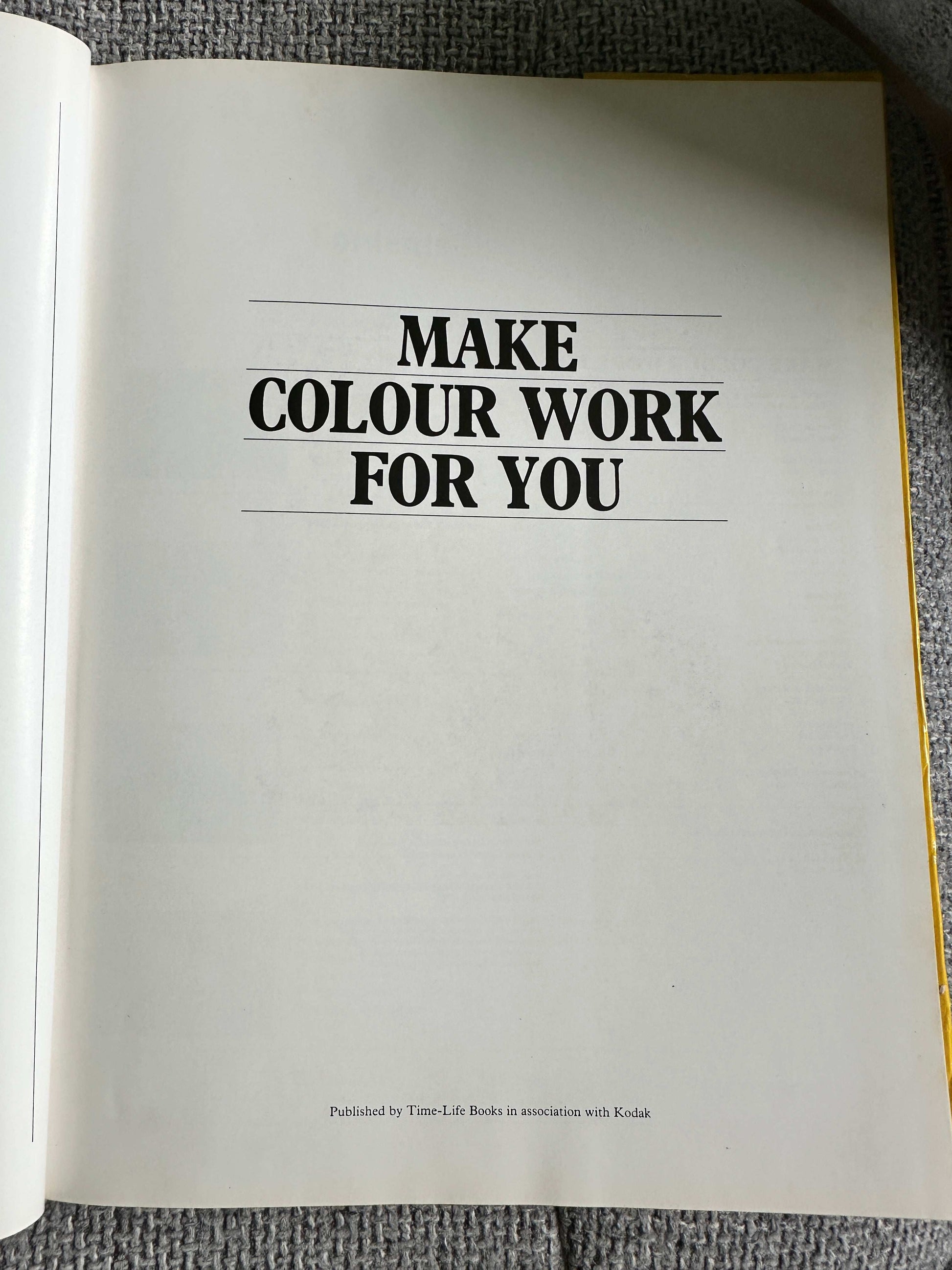 Open page of Kodak creative photography book with the title Make Colour Work For You displayed prominently