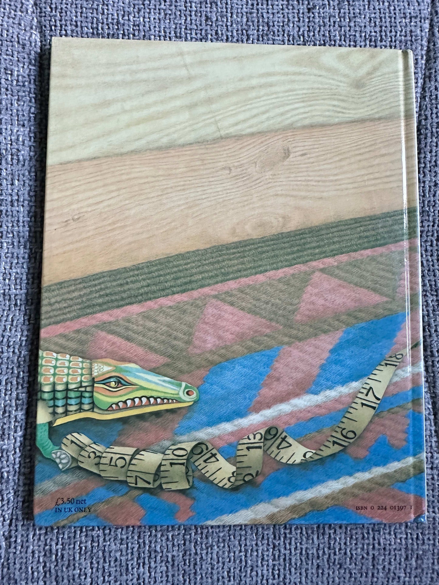 La Corona and The Tin Frog first edition featuring a colorful crocodile illustration on the cover