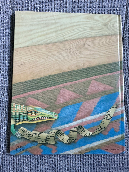 La Corona and The Tin Frog first edition featuring a colorful crocodile illustration on the cover