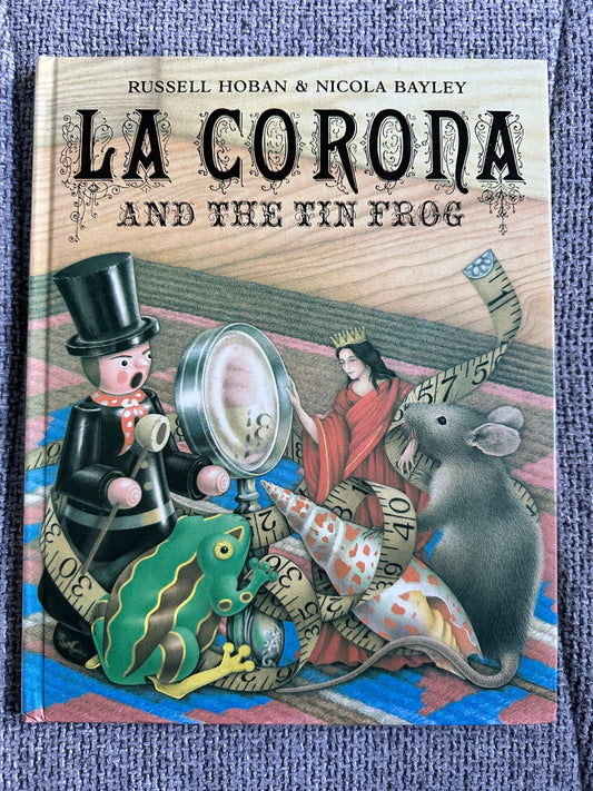 La Corona and The Tin Frog first edition children's book with colorful illustrations and whimsical characters