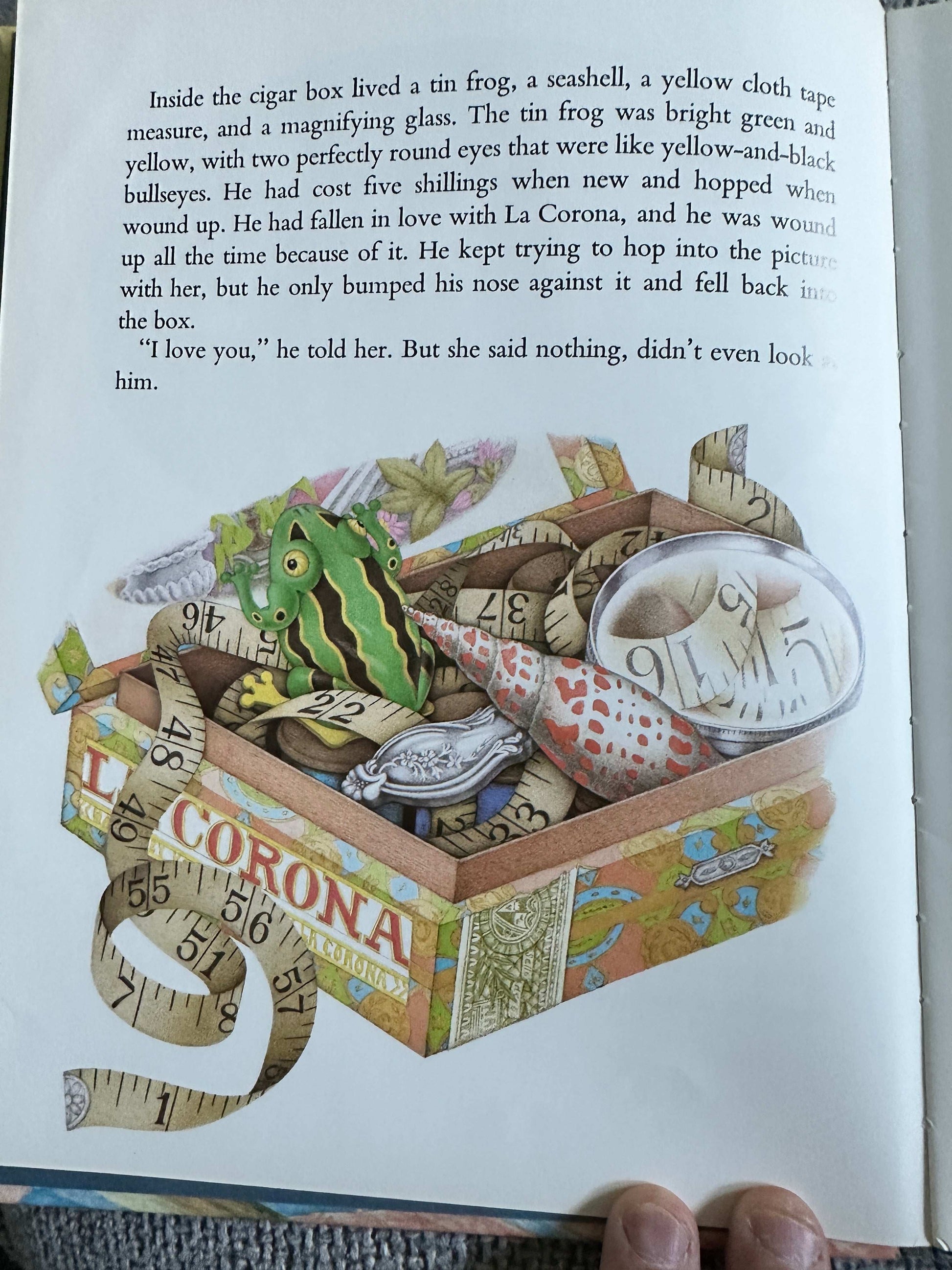 Illustration from La Corona and The Tin Frog first edition showing a tin frog in a cigar box
