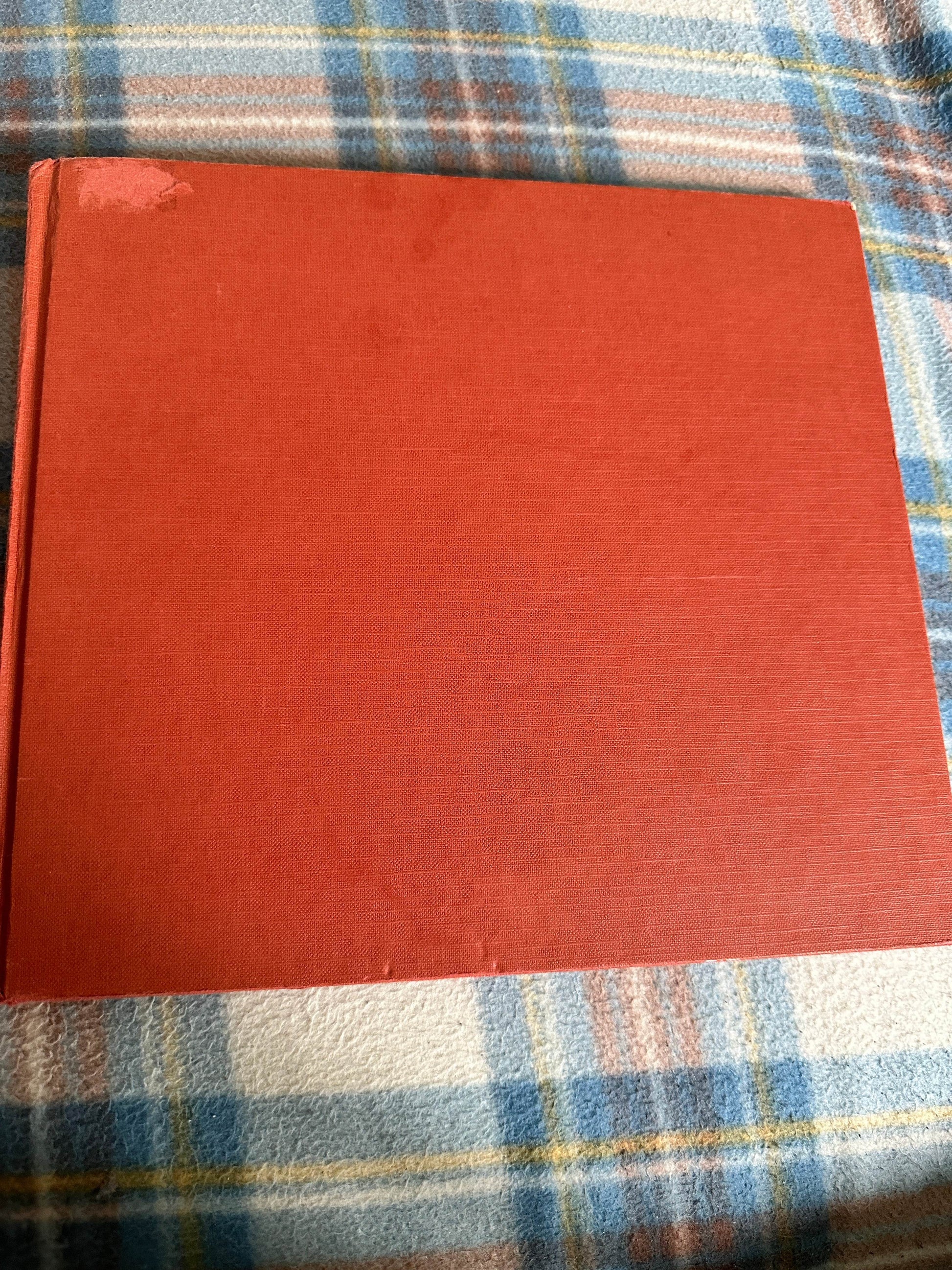 Michael Rosen Helen Oxenbury rare book with a plain red cover on a plaid background