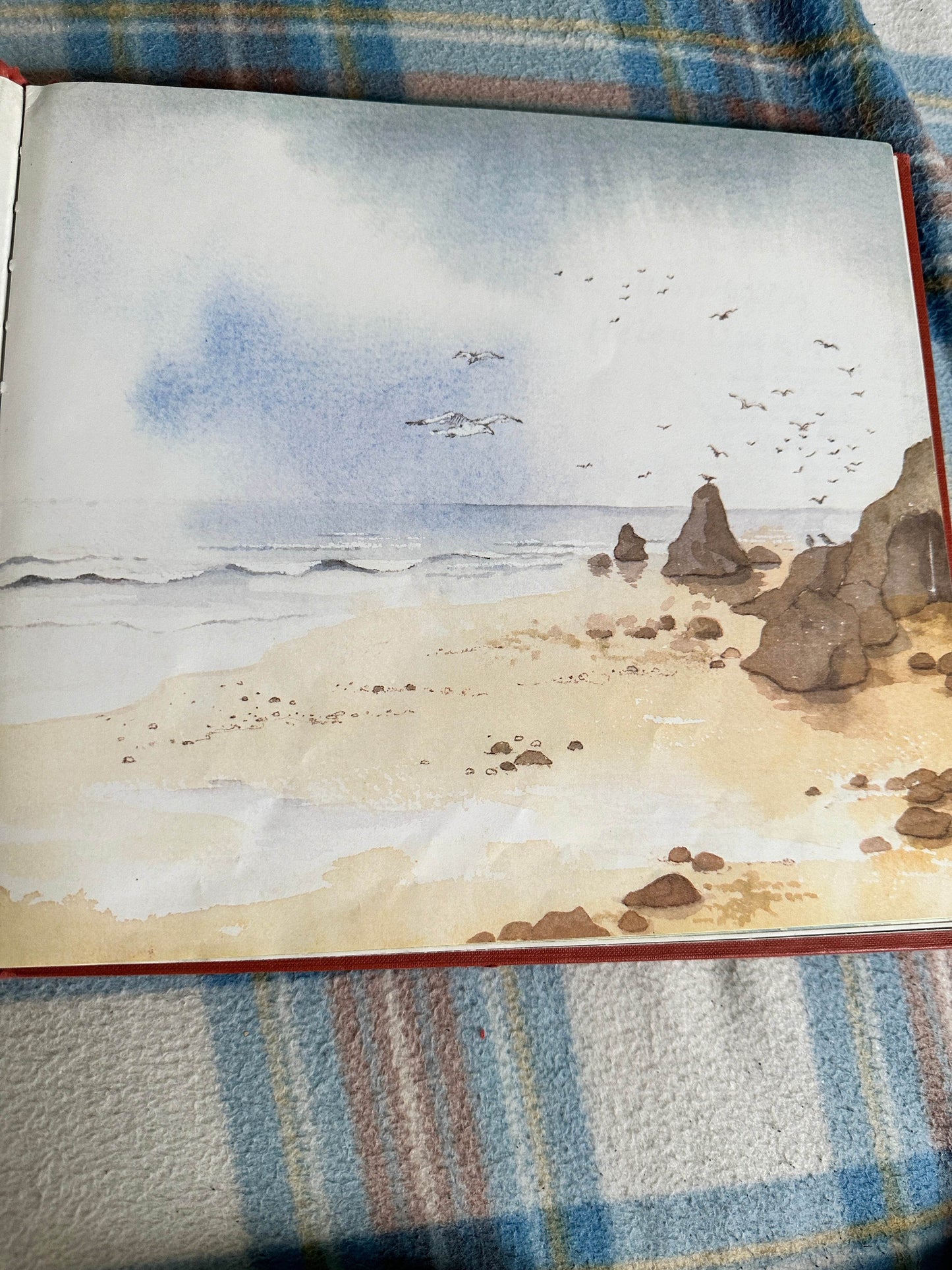 Beautiful illustration of a serene beach scene from the Michael Rosen Helen Oxenbury rare book