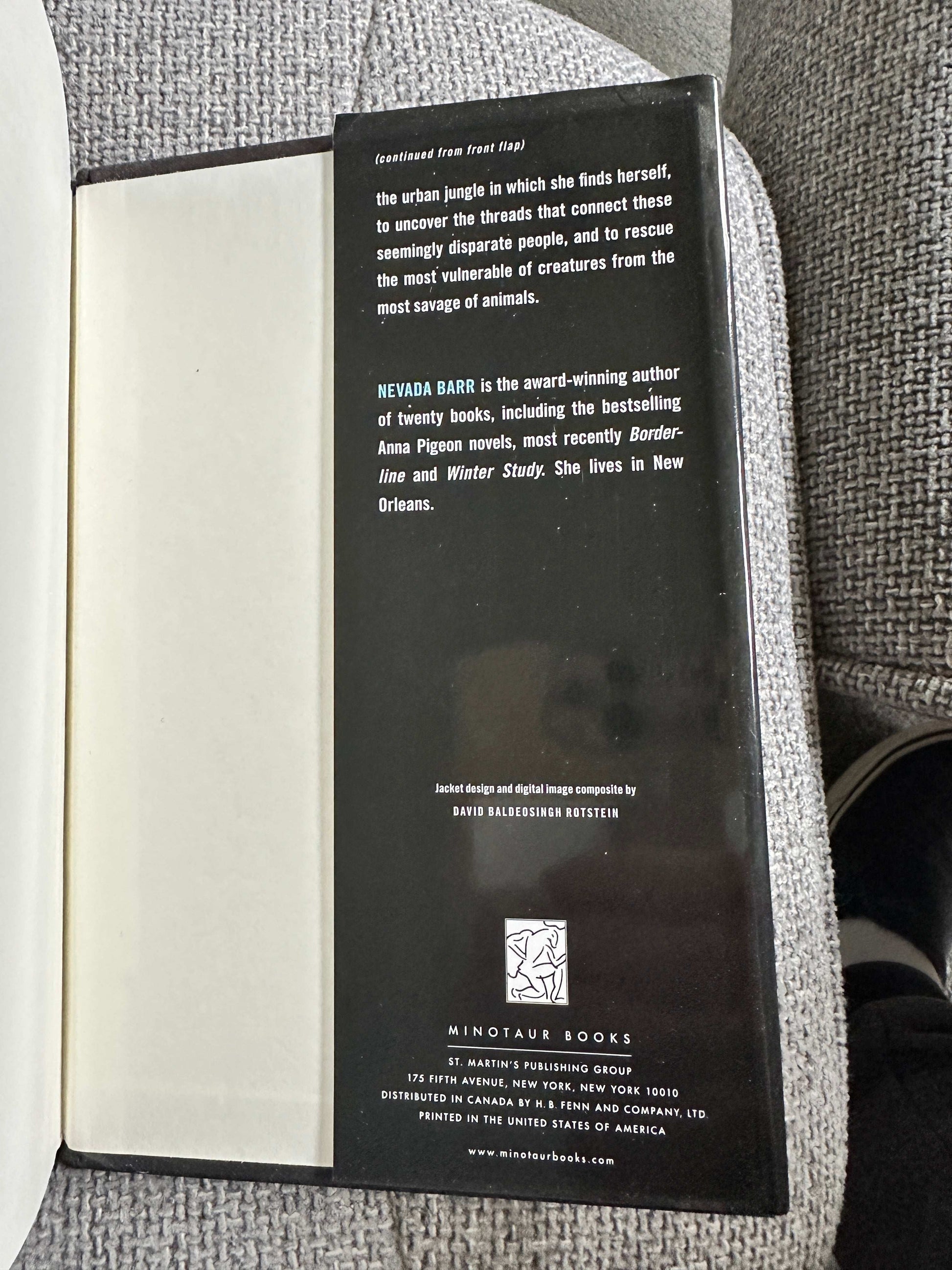 Back cover of Nevada Barr Burn first edition showcasing author bio and publisher details