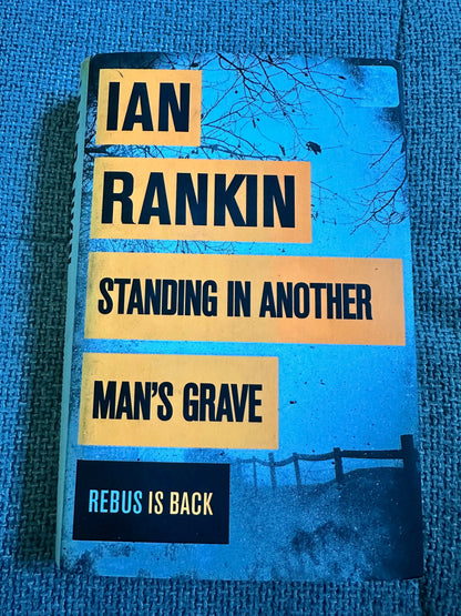 Ian Rankin Standing in Another Man's Grave book cover featuring Rebus for collectible Rebus novels UK