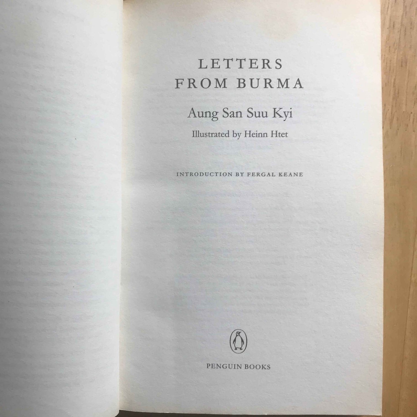 Open title page of Letters from Burma Aung San Suu Kyi book showing author name introduction and Penguin logo