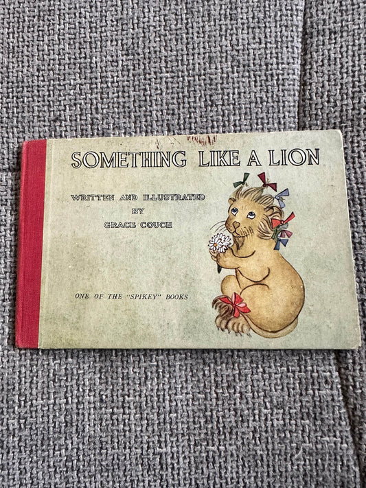 Something Like A Lion vintage children's book by Grace Couch with whimsical illustration and colorful cover
