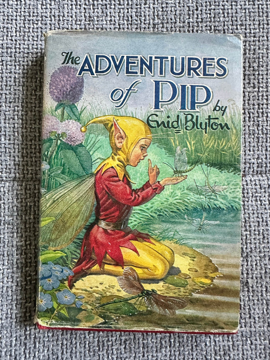 The Adventures of Pip Enid Blyton vintage book cover featuring a whimsical fairy by a pond