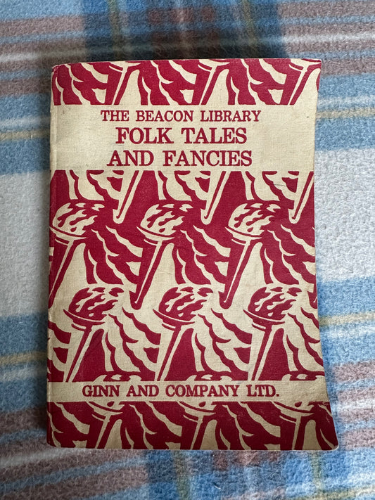 The Beacon Library Folk Tales and Fancies children's book with vibrant red cover design featuring torches