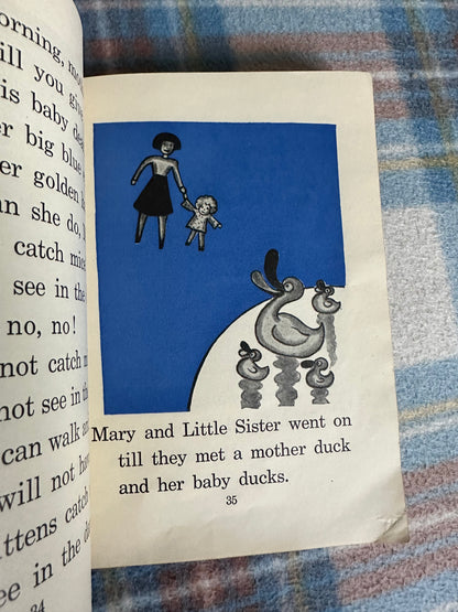 Illustration from The Beacon Library Folk Tales and Fancies featuring a girl with a doll and a mother duck with ducklings