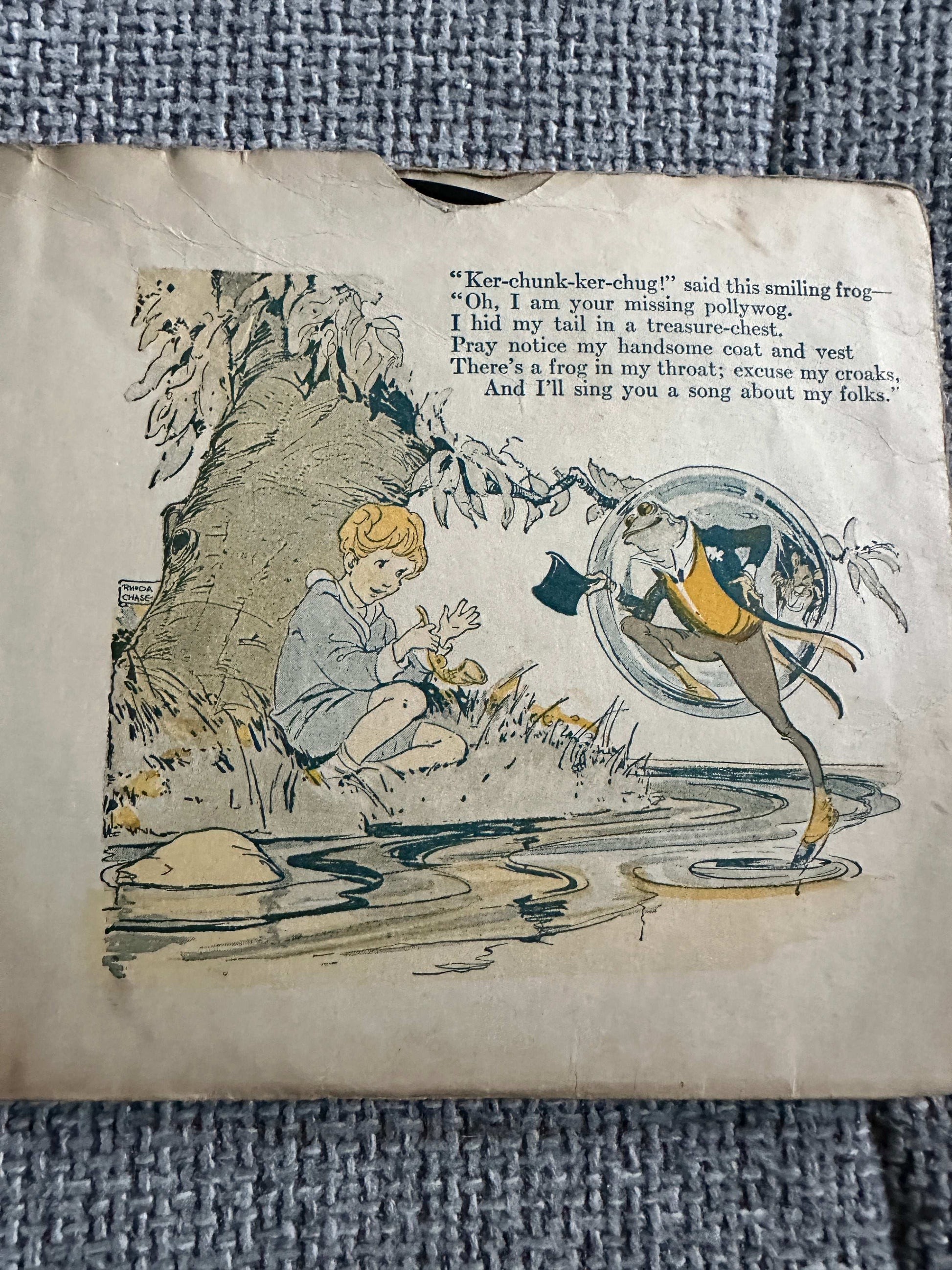 The Funny Froggy Bubble Book first edition featuring a boy and a frog by the water's edge