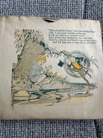 The Funny Froggy Bubble Book first edition featuring a boy and a frog by the water's edge