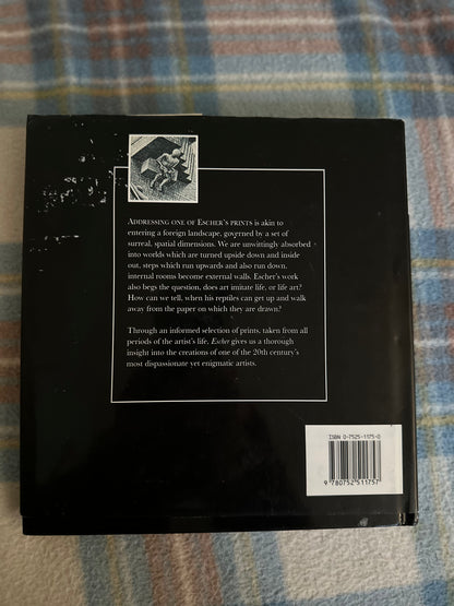 Back cover of The Life and Works of Escher Parragon featuring a description of Escher's prints and artistry