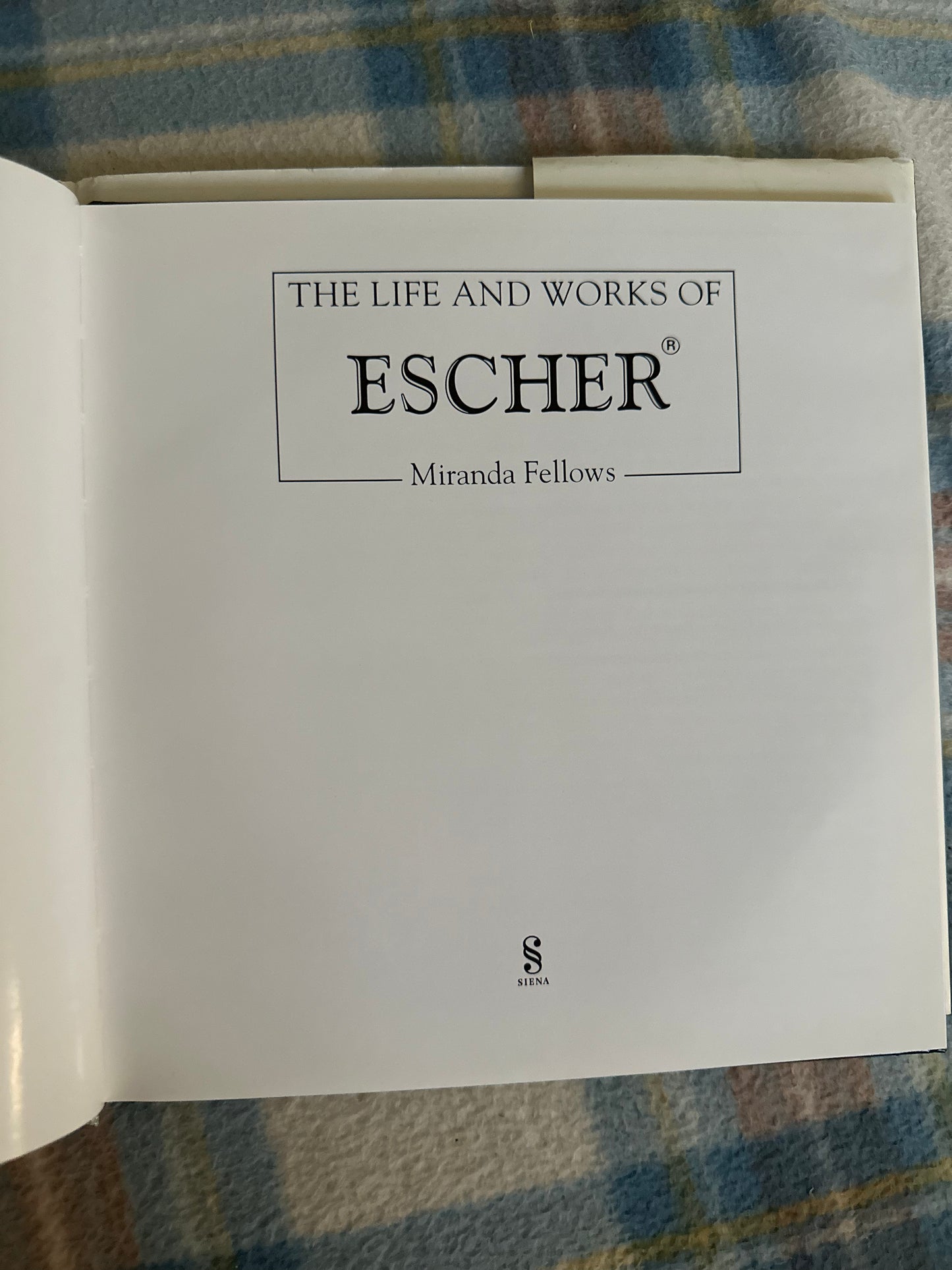 Title page from The Life and Works of Escher Parragon by Miranda Fellows with elegant typography