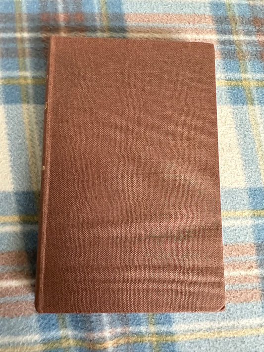 The Man-eater of Malgudi vintage book by R.K. Narayan with a textured brown cover