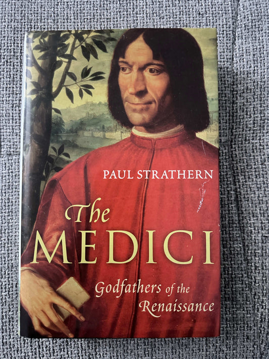 The Medici Godfathers Of The Renaissance first edition by Paul Strathern featuring a portrait of a Medici leader