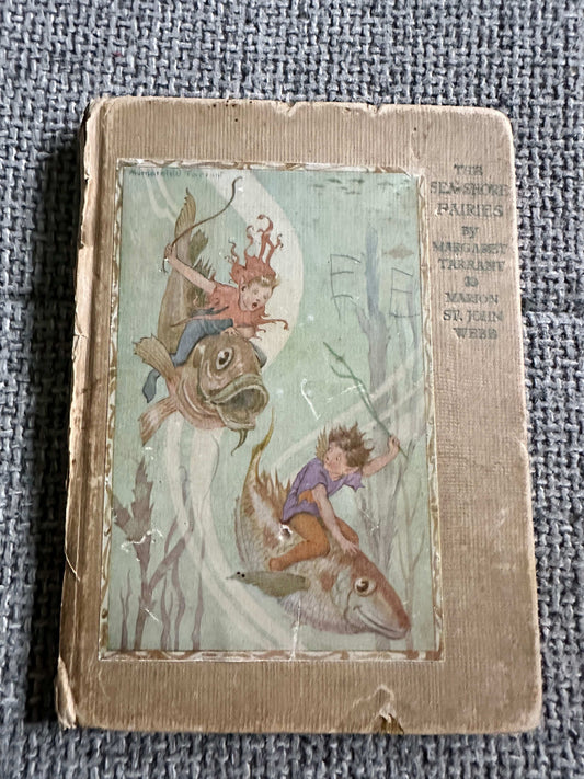 The Sea-Shore Fairies first edition book featuring children riding fish with colorful illustrations
