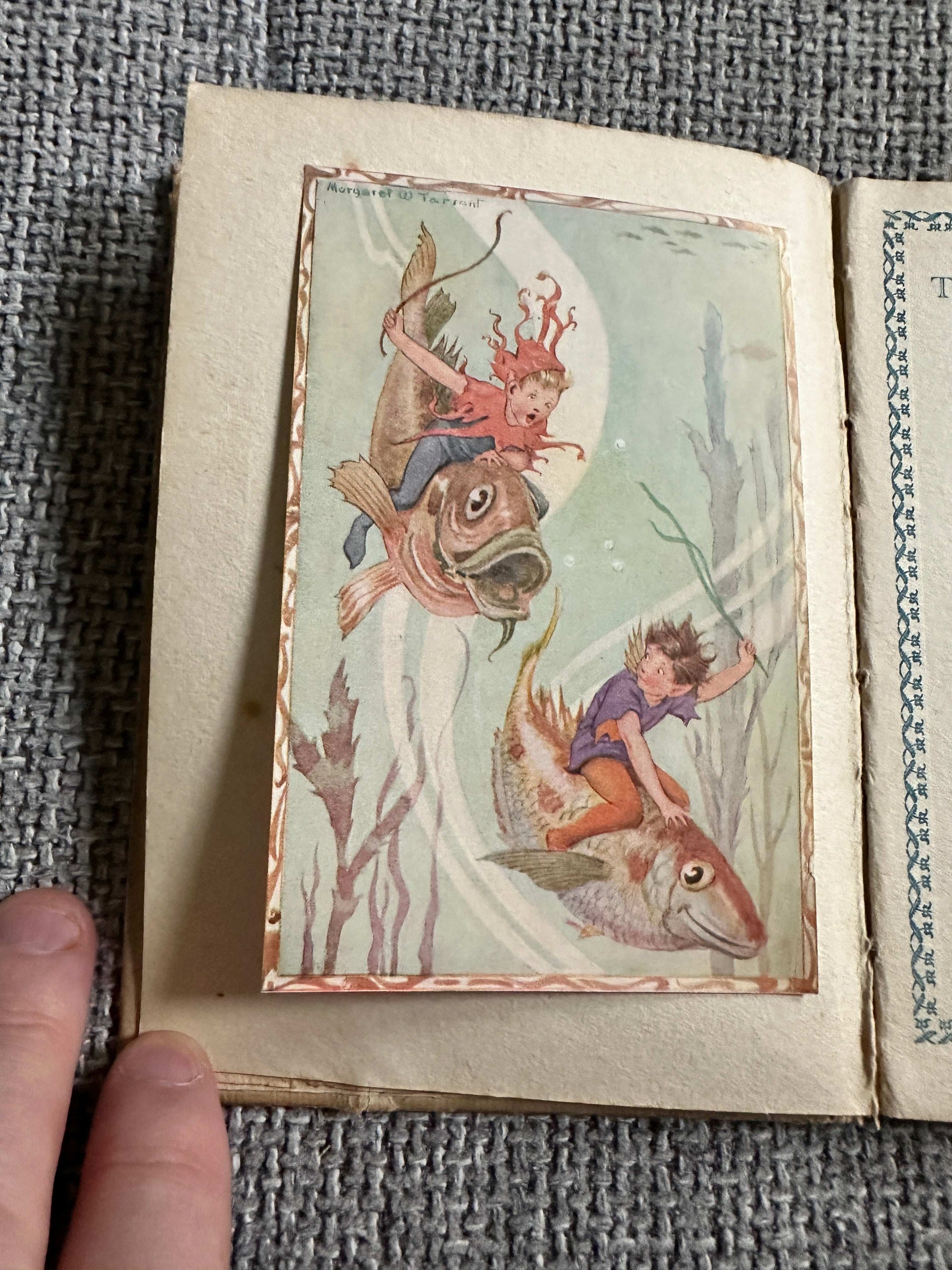 Illustration from The Sea-Shore Fairies first edition book featuring fairies riding fish underwater