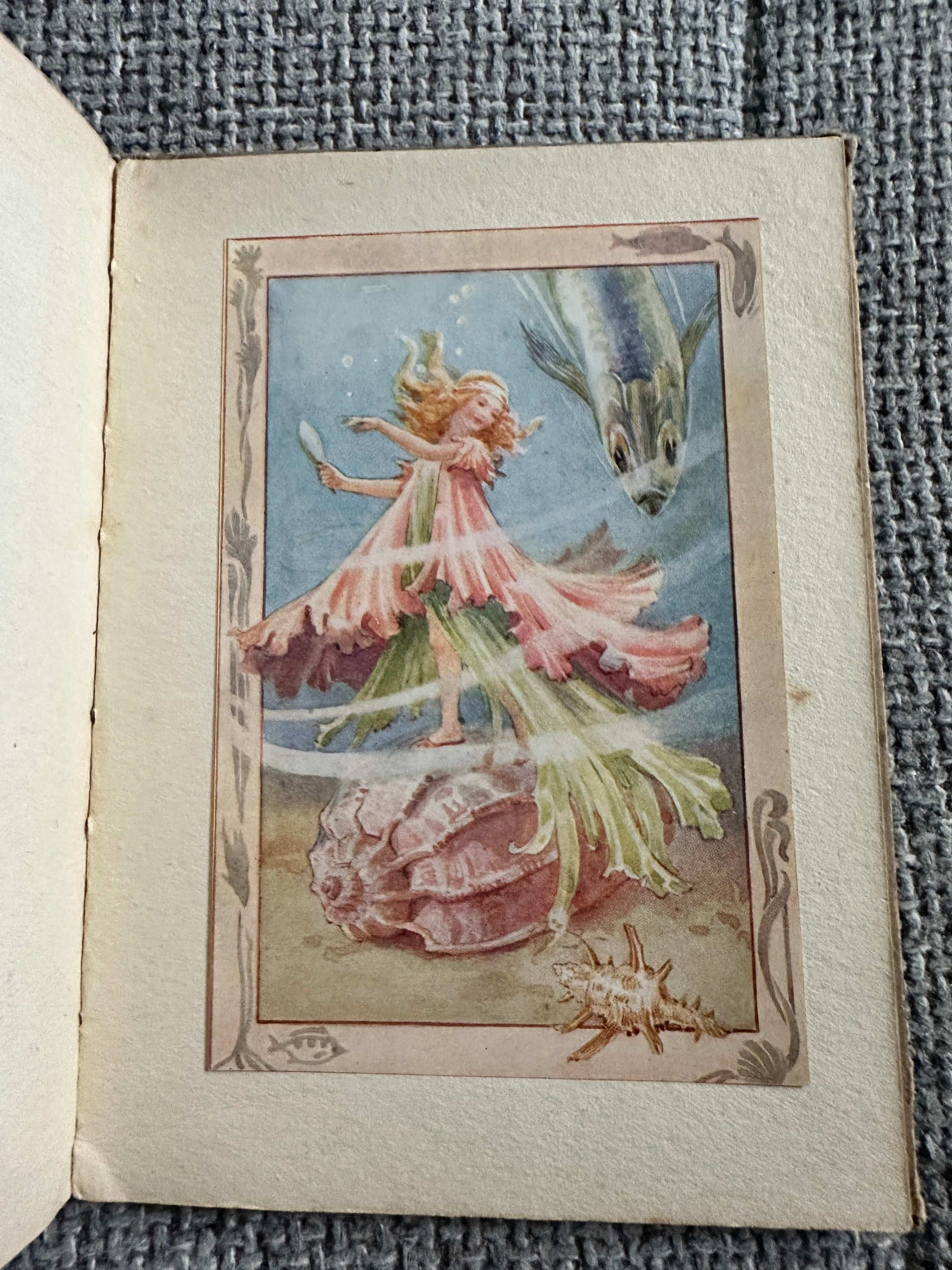 The Sea-Shore Fairies first edition book illustration featuring a fairy dancing by the ocean with sea creatures