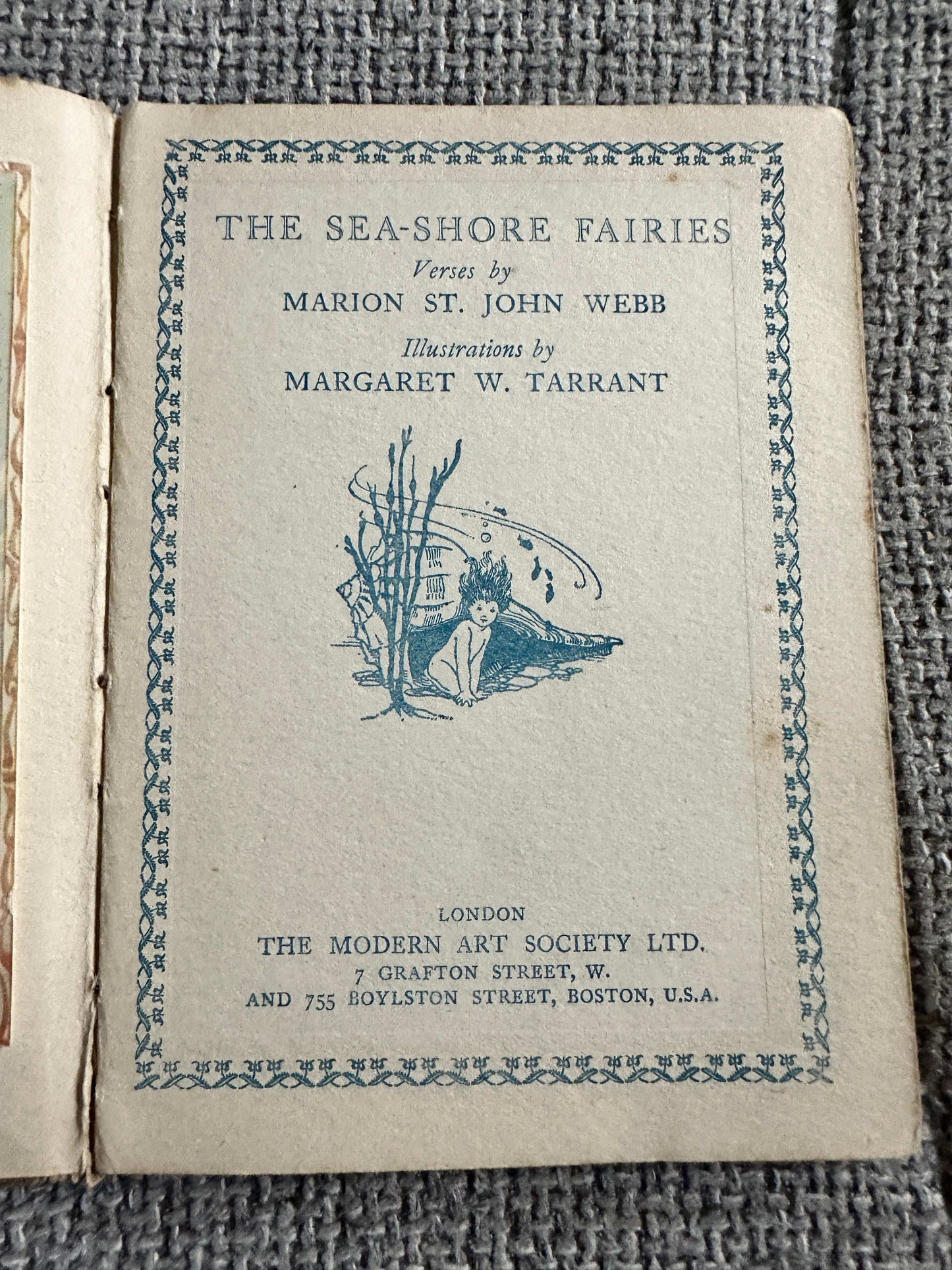 The Sea-Shore Fairies first edition book cover featuring whimsical illustrations by Margaret W. Tarrant
