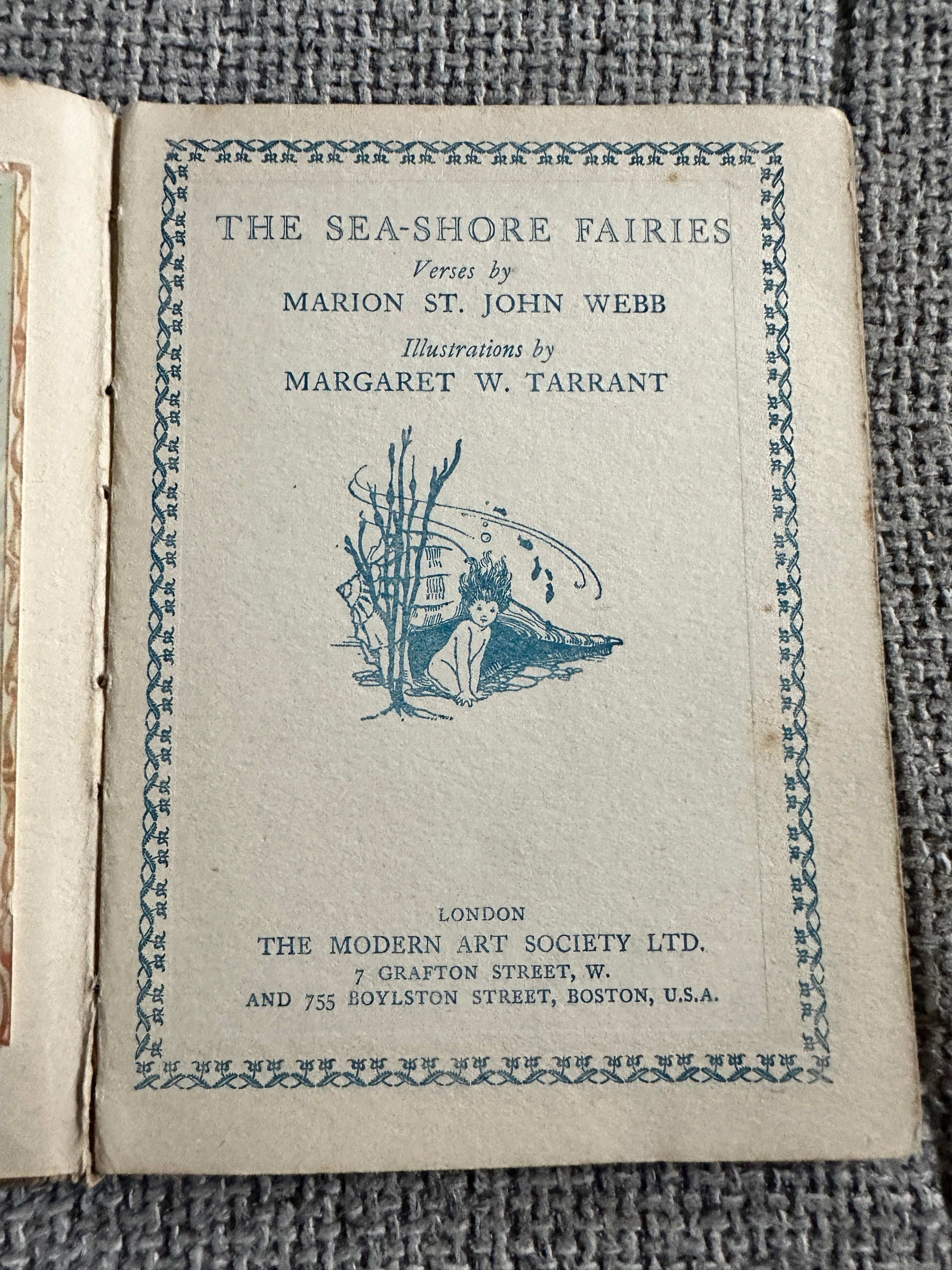 The Sea-Shore Fairies first edition book cover featuring whimsical illustrations by Margaret W. Tarrant