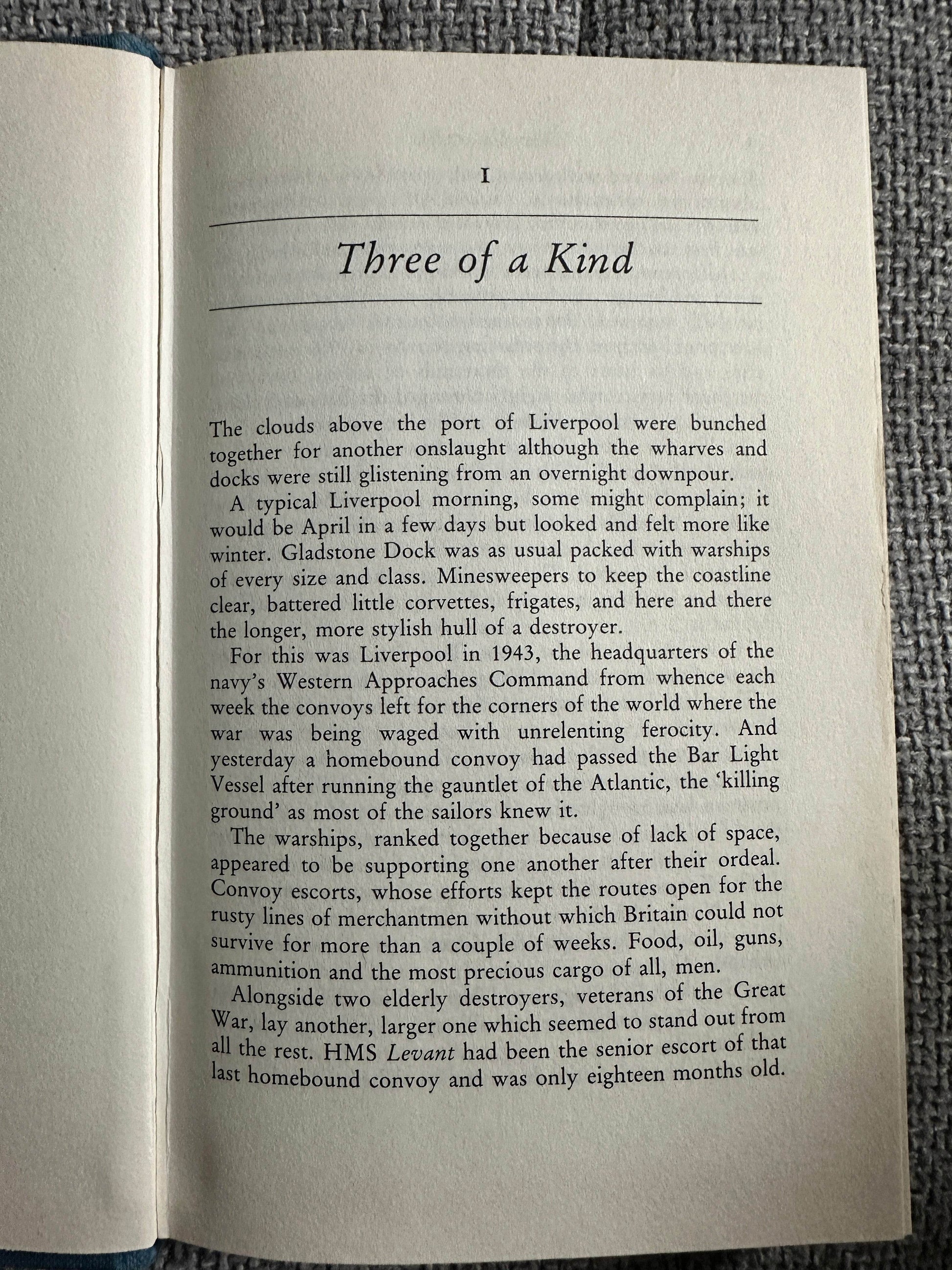 The Volunteers Douglas Reeman first edition book page showcasing the opening chapter with text on the port of Liverpool