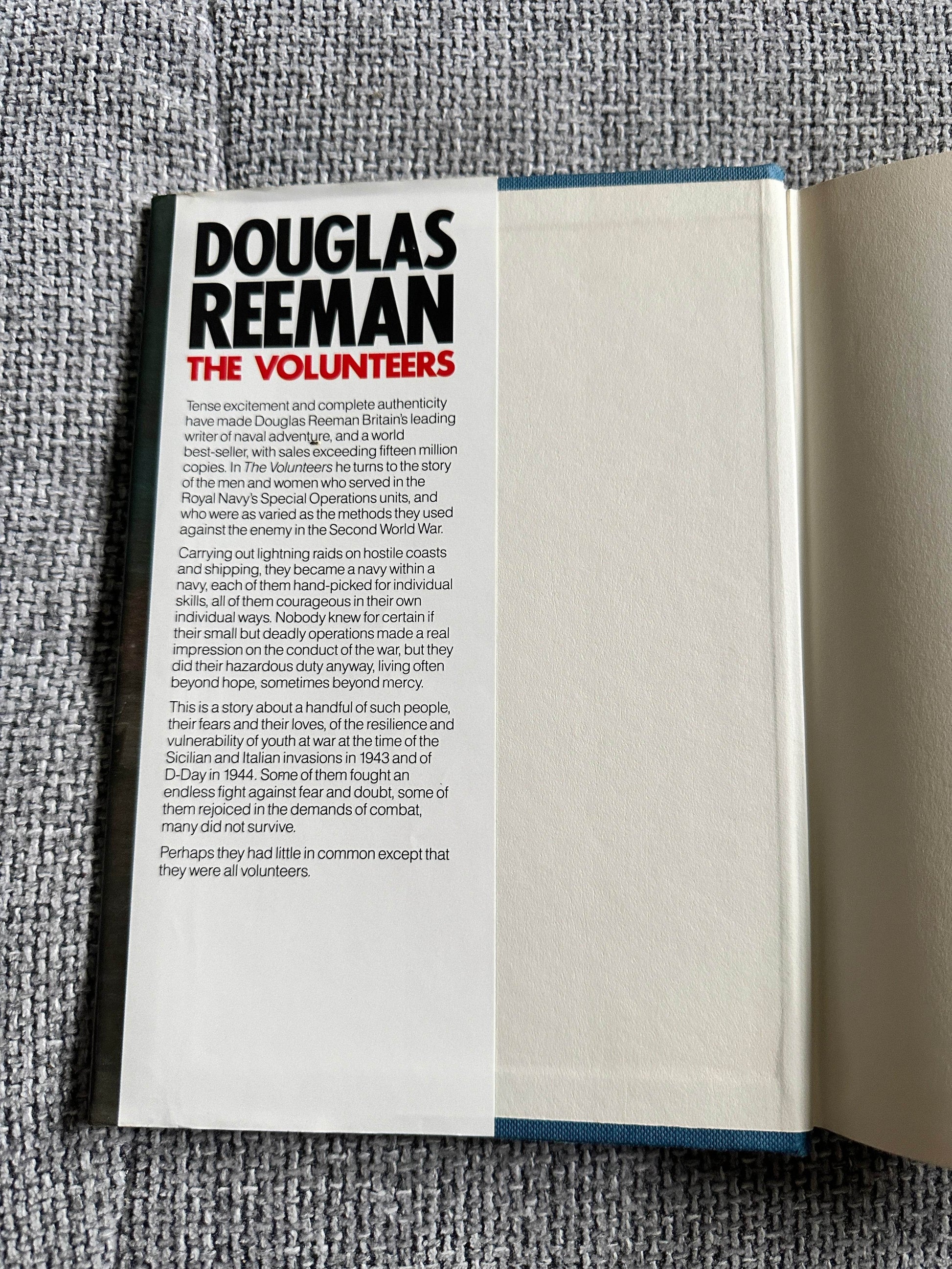 The Volunteers Douglas Reeman first edition book cover featuring author name and book details