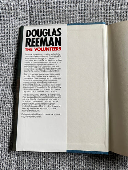 The Volunteers Douglas Reeman first edition book cover featuring author name and book details