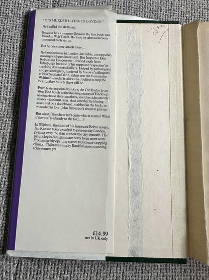 Inside cover of Wolfman 1992 Century hardcover book featuring a synopsis and price tag in GBP