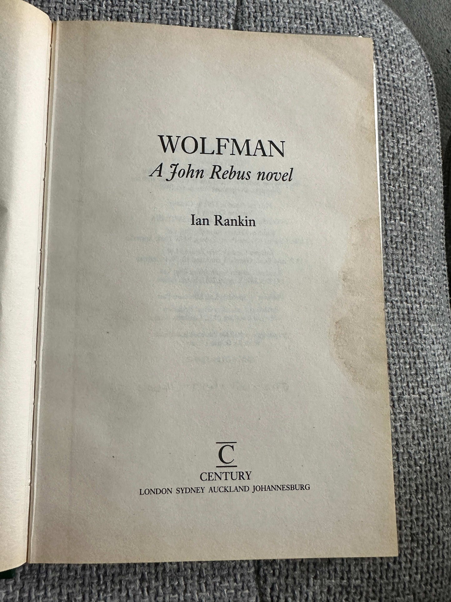 Open page of Wolfman 1992 Century hardcover by Ian Rankin featuring title and author details
