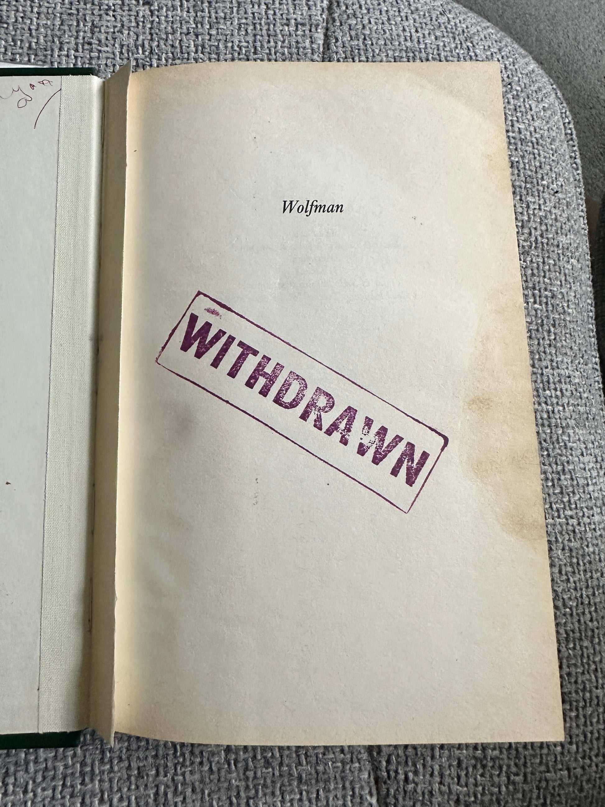 Wolfman 1992 Century hardcover book with a withdrawn stamp on the title page