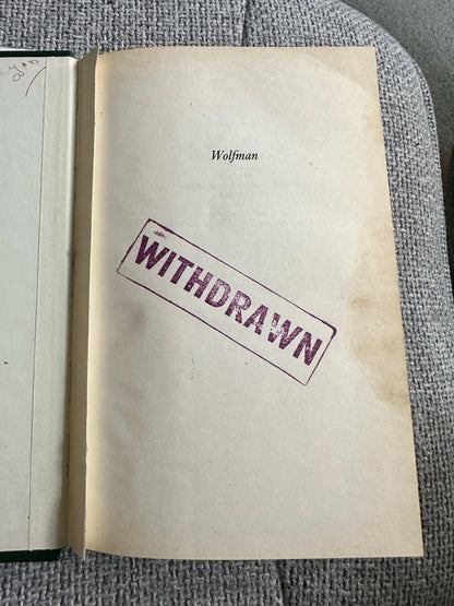 Wolfman 1992 Century hardcover book with a withdrawn stamp on the title page