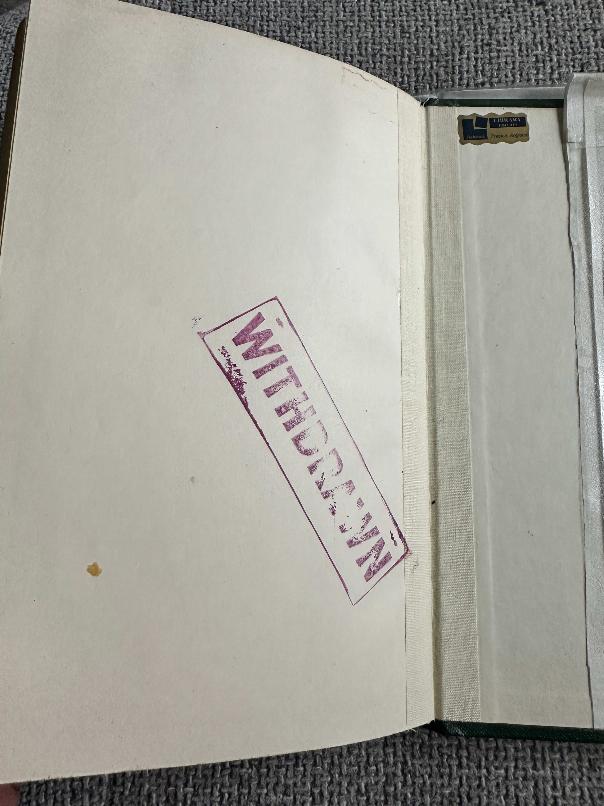 Inside cover of Wolfman 1992 Century hardcover with a 'WITHDRAWN' stamp